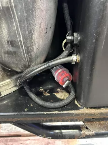 New diesel fuel filter fitted during industrial hot pressure washer repair and fuel system overhaul 